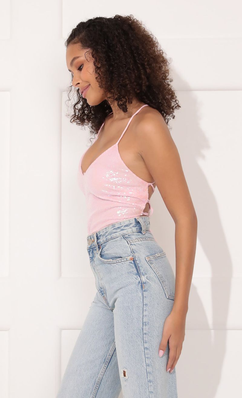 Picture Party Sequin Bodysuit in Baby Pink. Source: https://media.lucyinthesky.com/data/Nov21_1/800xAUTO/1V9A0938.JPG