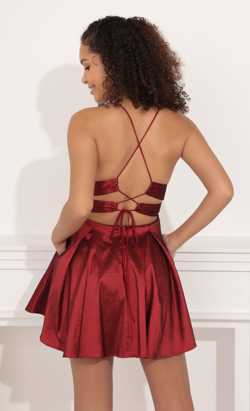 Picture Janine Fit and Flare Dress in Burgundy. Source: https://media.lucyinthesky.com/data/Nov21_1/850xAUTO/1V9A2617.JPG