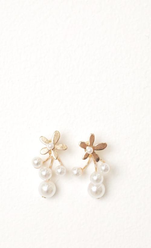 Picture Fallen Petals Pearl Earrings in Gold. Source: https://media.lucyinthesky.com/data/Nov21_2/500xAUTO/1J7A0998.JPG