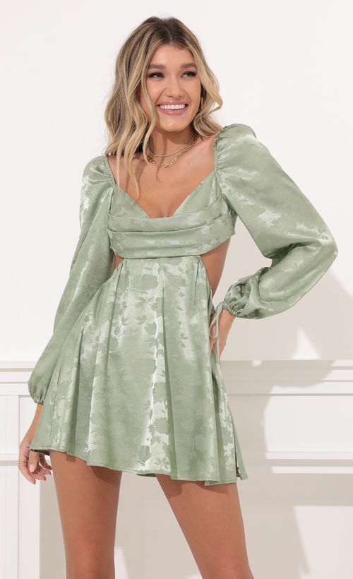 Picture Krista Long Sleeve Fit and Flare Dress in Green Floral Satin. Source: https://media.lucyinthesky.com/data/Nov21_2/500xAUTO/1V9A0062.JPG