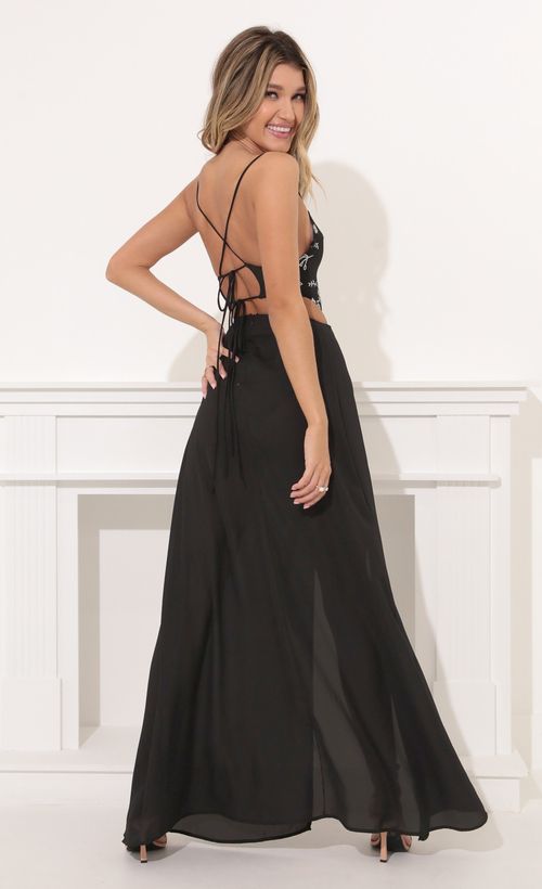 Picture Paris Silver Sequin Lace Maxi Dress in Black. Source: https://media.lucyinthesky.com/data/Nov21_2/500xAUTO/1V9A5341.JPG