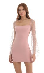 Picture Korra Sequin Flare Sleeve Dress in Pink. Source: https://media.lucyinthesky.com/data/Nov22/150xAUTO/a8f923f1-0240-49a3-9bb1-e5b09b13b18f.jpg