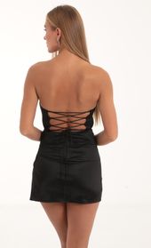 Picture thumb Aurelia Rhinestone Bust Satin Dress in Black. Source: https://media.lucyinthesky.com/data/Nov22/170xAUTO/0c4a4a3c-012d-4624-abc4-9cd89df76494.jpg