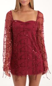 Picture thumb Wynnie Fringe Sequin Flare Sleeve Dress in Red. Source: https://media.lucyinthesky.com/data/Nov22/170xAUTO/151a5491-9f63-401e-9eef-7ef89b3ee8fd.jpg