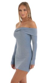 Picture thumb Emelia Metallic Knit Off The Shoulder Dress in Blue. Source: https://media.lucyinthesky.com/data/Nov22/170xAUTO/41da692e-f175-4912-8622-d3691ce1ea65.jpg