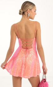 Picture thumb Jewel Sequin Cowl Neck Dress in Orange. Source: https://media.lucyinthesky.com/data/Nov22/170xAUTO/6ca22ca6-2611-46f0-8693-02f6f9a1b9a0.jpg