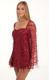 Picture thumb Wynnie Fringe Sequin Flare Sleeve Dress in Red. Source: https://media.lucyinthesky.com/data/Nov22/170xAUTO/91cfa0a2-6cd1-465b-b6bc-b8802227a364.jpg