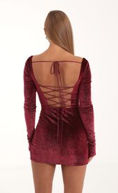 Picture thumb Kaya Velvet Glitter Long Sleeve Corset Dress in Red. Source: https://media.lucyinthesky.com/data/Nov22/170xAUTO/91e1d648-c404-4591-942e-a833a43bac44.jpg