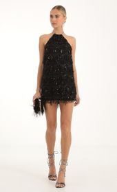 Picture thumb Vesper Fringe Sequin Halter Dress in Black. Source: https://media.lucyinthesky.com/data/Nov22/170xAUTO/9f3ac471-cca0-4854-87d6-a425923dd227.jpg