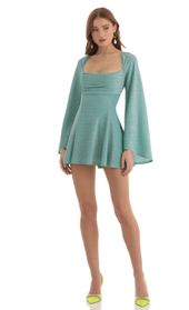 Picture thumb Sirena Metallic Knit Flare Sleeve Dress in Teal. Source: https://media.lucyinthesky.com/data/Nov22/170xAUTO/e36161a5-00a7-476f-a1fd-566f918c26e6.jpg