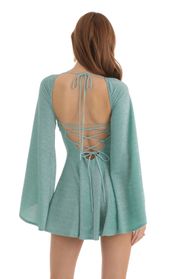Picture thumb Sirena Metallic Knit Flare Sleeve Dress in Teal. Source: https://media.lucyinthesky.com/data/Nov22/170xAUTO/e986e253-397f-45a0-aad2-18e55963349b.jpg