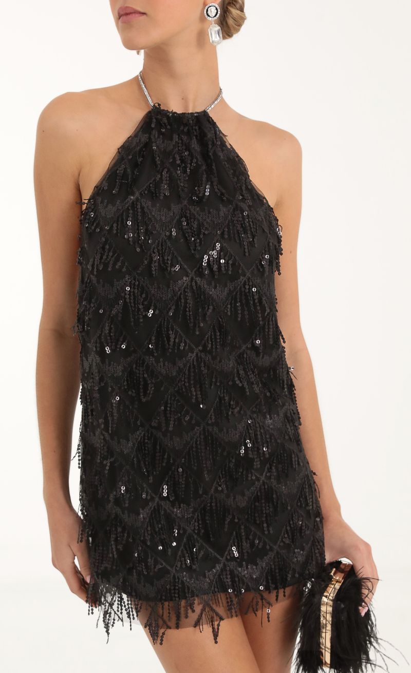 Picture Vesper Fringe Sequin Halter Dress in Black. Source: https://media.lucyinthesky.com/data/Nov22/800xAUTO/0c597250-27b3-4f75-8ebe-2ed62d0ef0fb.jpg