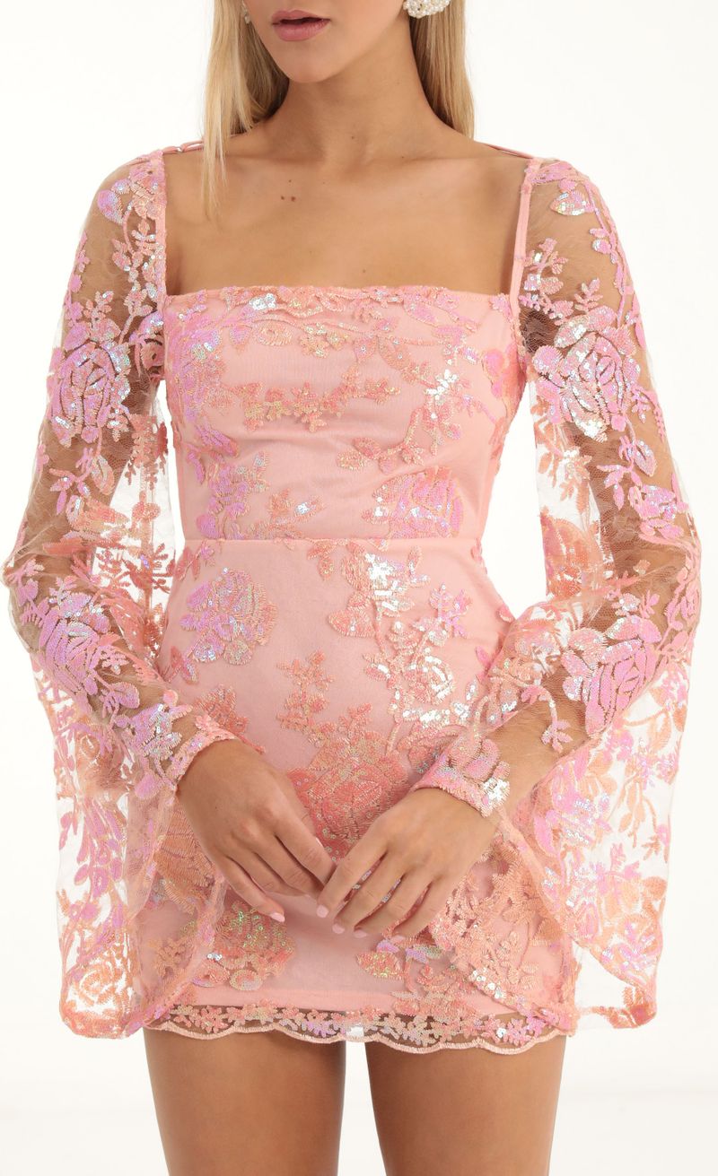 Picture Vida Lace Sequin Flare Sleve Dress in Peach. Source: https://media.lucyinthesky.com/data/Nov22/800xAUTO/5f6eee2f-84b4-40d8-a40c-954c97216fcf.jpg