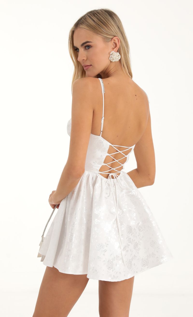 Picture Tabby Floral Jacquard Corset Dress in White. Source: https://media.lucyinthesky.com/data/Nov22/800xAUTO/64e3a126-9343-4b38-8ed3-7b4e9ea08387.jpg