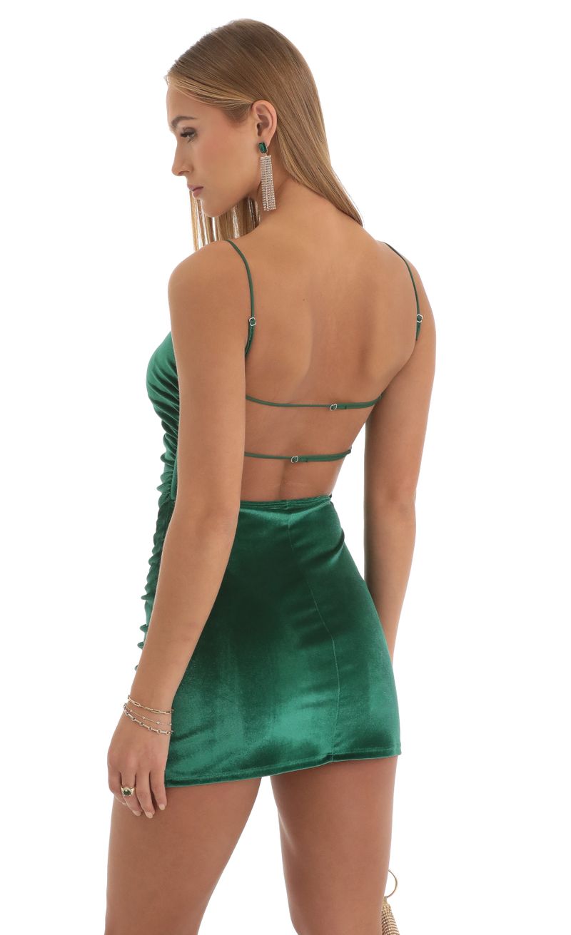 Picture Norma Velvet Ruched Bodycon Dress in Green. Source: https://media.lucyinthesky.com/data/Nov22/800xAUTO/6d0661e2-039e-41a0-8ce4-61cbf40dda53.jpg