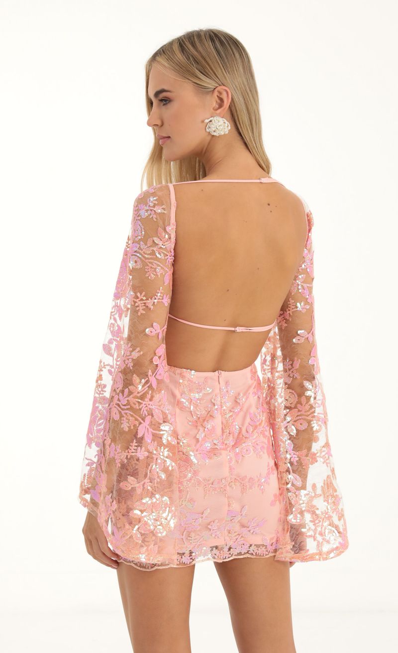 Picture Vida Lace Sequin Flare Sleve Dress in Peach. Source: https://media.lucyinthesky.com/data/Nov22/800xAUTO/7bad56f3-3ccc-4ac4-809b-d3cb4d548c18.jpg