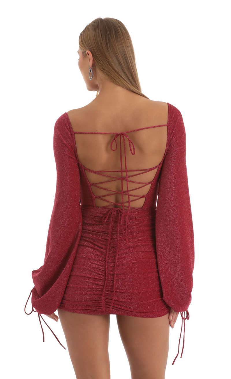 Picture Jacky Glitter Long Sleeve Corset Dress in Red. Source: https://media.lucyinthesky.com/data/Nov22/800xAUTO/85ffecad-c1b6-4c58-9df7-98f749999a2c.jpg