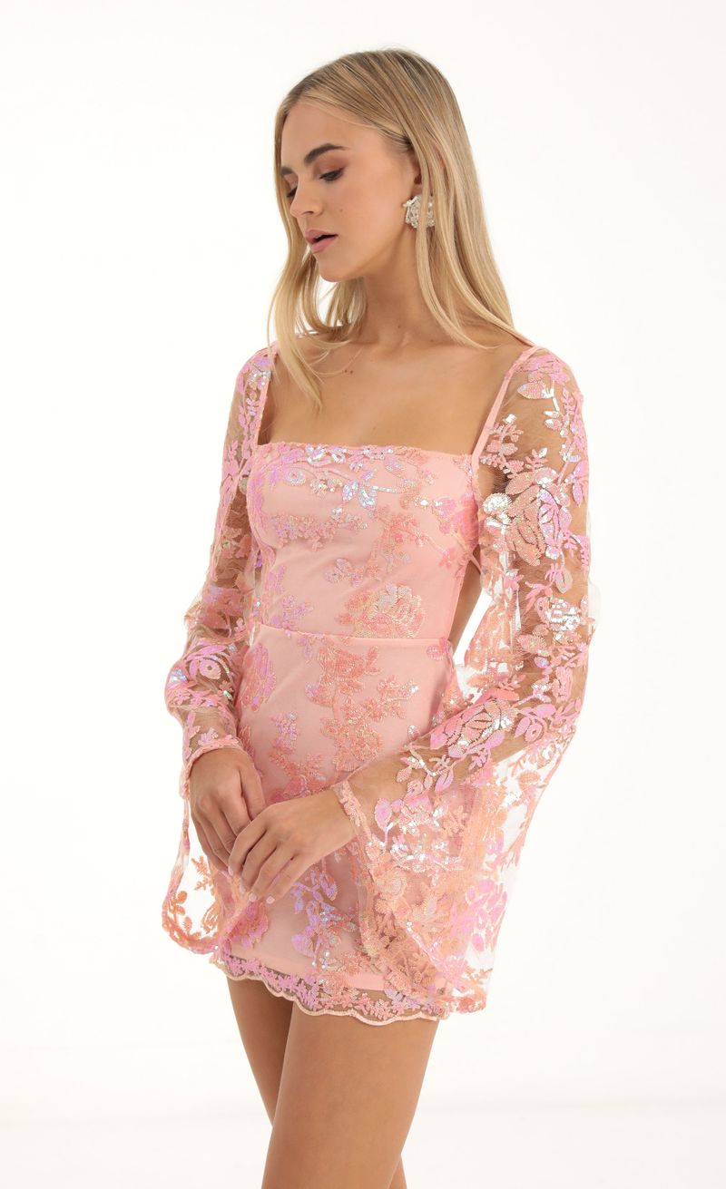 Picture Vida Lace Sequin Flare Sleve Dress in Peach. Source: https://media.lucyinthesky.com/data/Nov22/800xAUTO/b766d2dc-b537-47c0-8cc4-b1a94fe7bf02.jpg