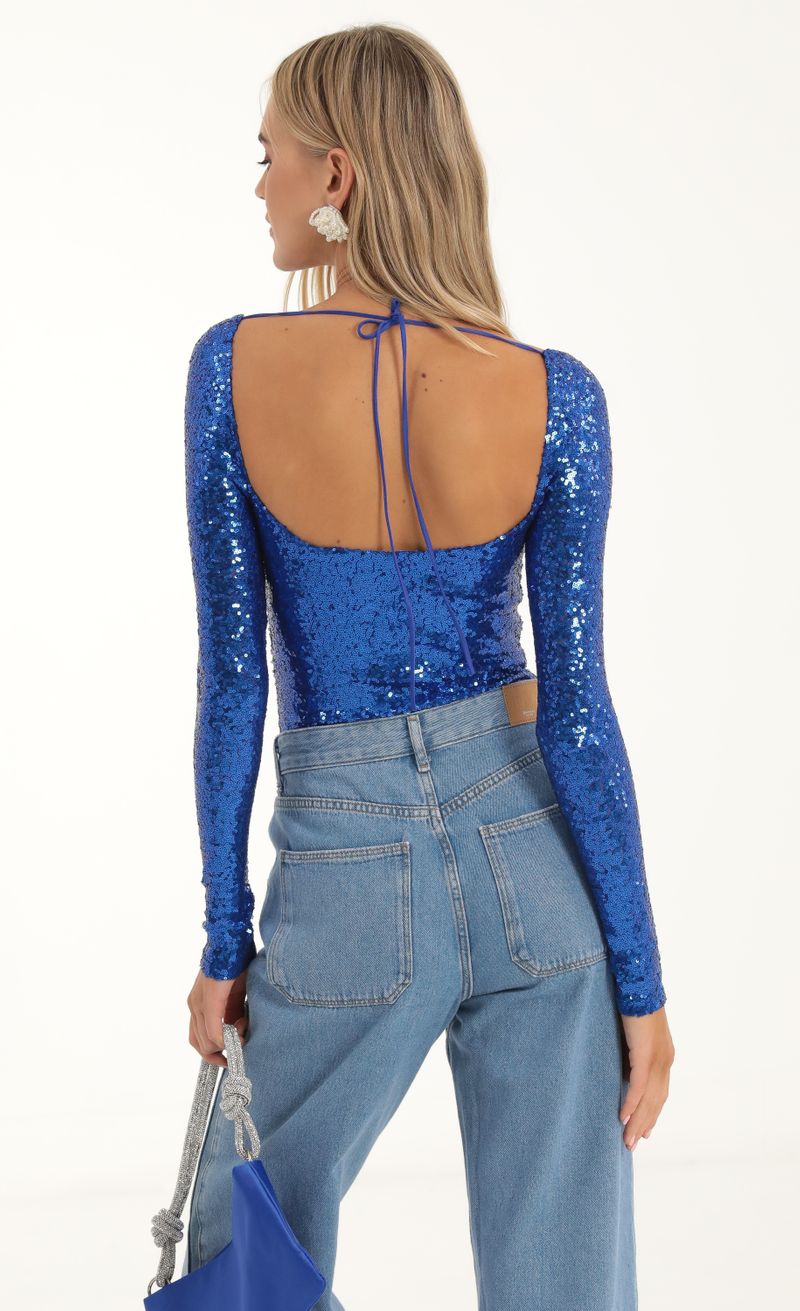 Picture Aislin Sequin Long Sleeve Bodysuit in Blue. Source: https://media.lucyinthesky.com/data/Nov22/800xAUTO/b79dc489-f4f1-47a9-966a-66ef6eeefe8c.jpg