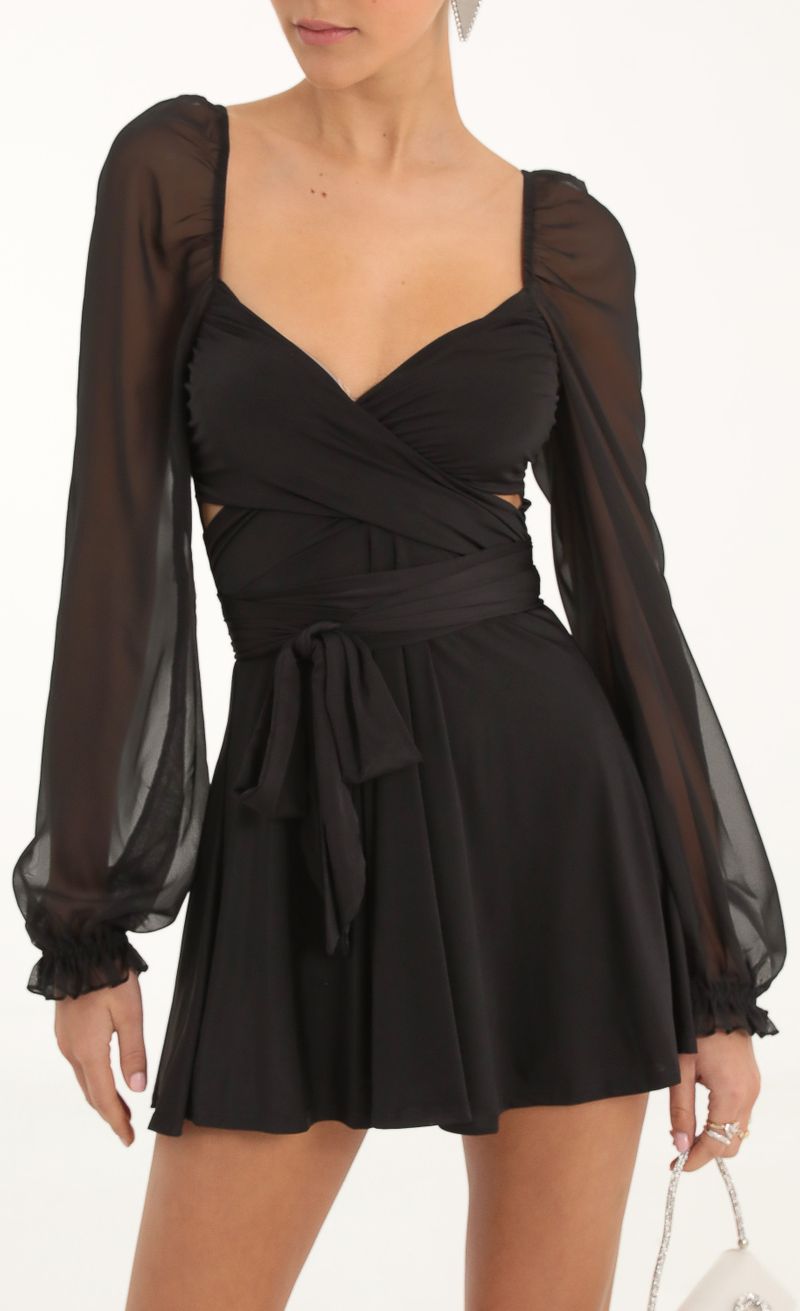 Picture Aliah Puff Chiffon Wrap Dress in Black. Source: https://media.lucyinthesky.com/data/Nov22/800xAUTO/c8d39f62-0265-4515-a31c-fc9329ed49ba.jpg