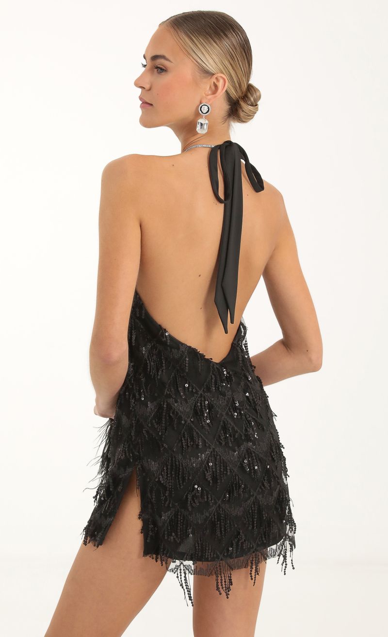 Picture Vesper Fringe Sequin Halter Dress in Black. Source: https://media.lucyinthesky.com/data/Nov22/800xAUTO/c93936ea-10f6-4de7-92de-dd5230600d5c.jpg