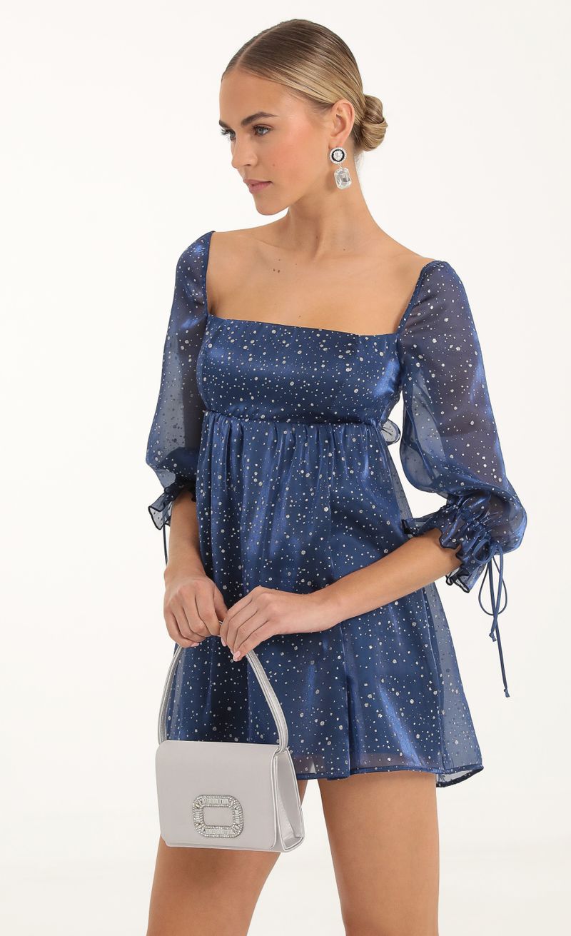 Picture Lula Glitter Puff Sleeve Baby Doll Dress in Blue. Source: https://media.lucyinthesky.com/data/Nov22/800xAUTO/d867bd37-3a26-499d-bf5f-ee8cec6c5b3f.jpg