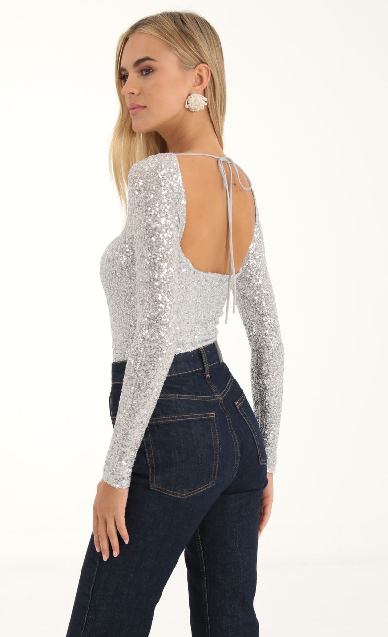 Picture Aislin Sequin Long Sleeve Bodysuit in Silver. Source: https://media.lucyinthesky.com/data/Nov22/800xAUTO/f1c982fc-9a05-4190-b1d3-3ec0f3a0cd4e.jpg