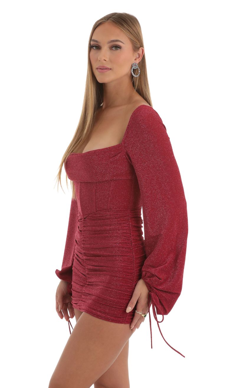 Picture Jacky Glitter Long Sleeve Corset Dress in Red. Source: https://media.lucyinthesky.com/data/Nov22/800xAUTO/fb25cf2d-48d2-49e0-8a7c-70476c3f73ed.jpg