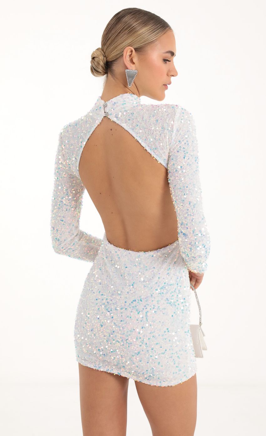 Picture Agnes Velvet Iridescent Sequin Open Back Dress in White. Source: https://media.lucyinthesky.com/data/Nov22/850xAUTO/33fde57d-b90e-4bcc-a413-247f1533dab0.jpg