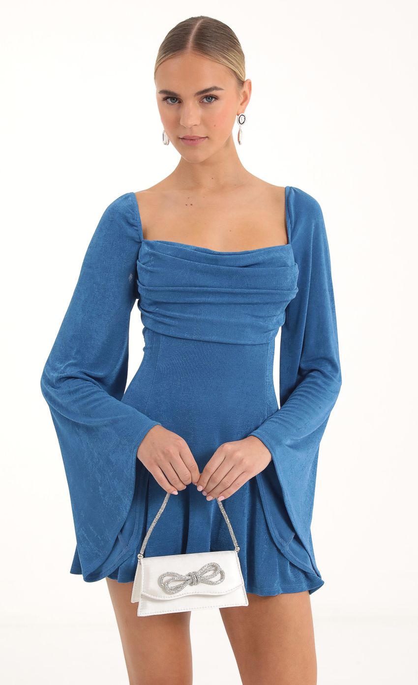 Picture Sirena Flare Sleeve Dress in Blue. Source: https://media.lucyinthesky.com/data/Nov22/850xAUTO/7c02c279-c5a9-43ac-b761-904196dcc629.jpg