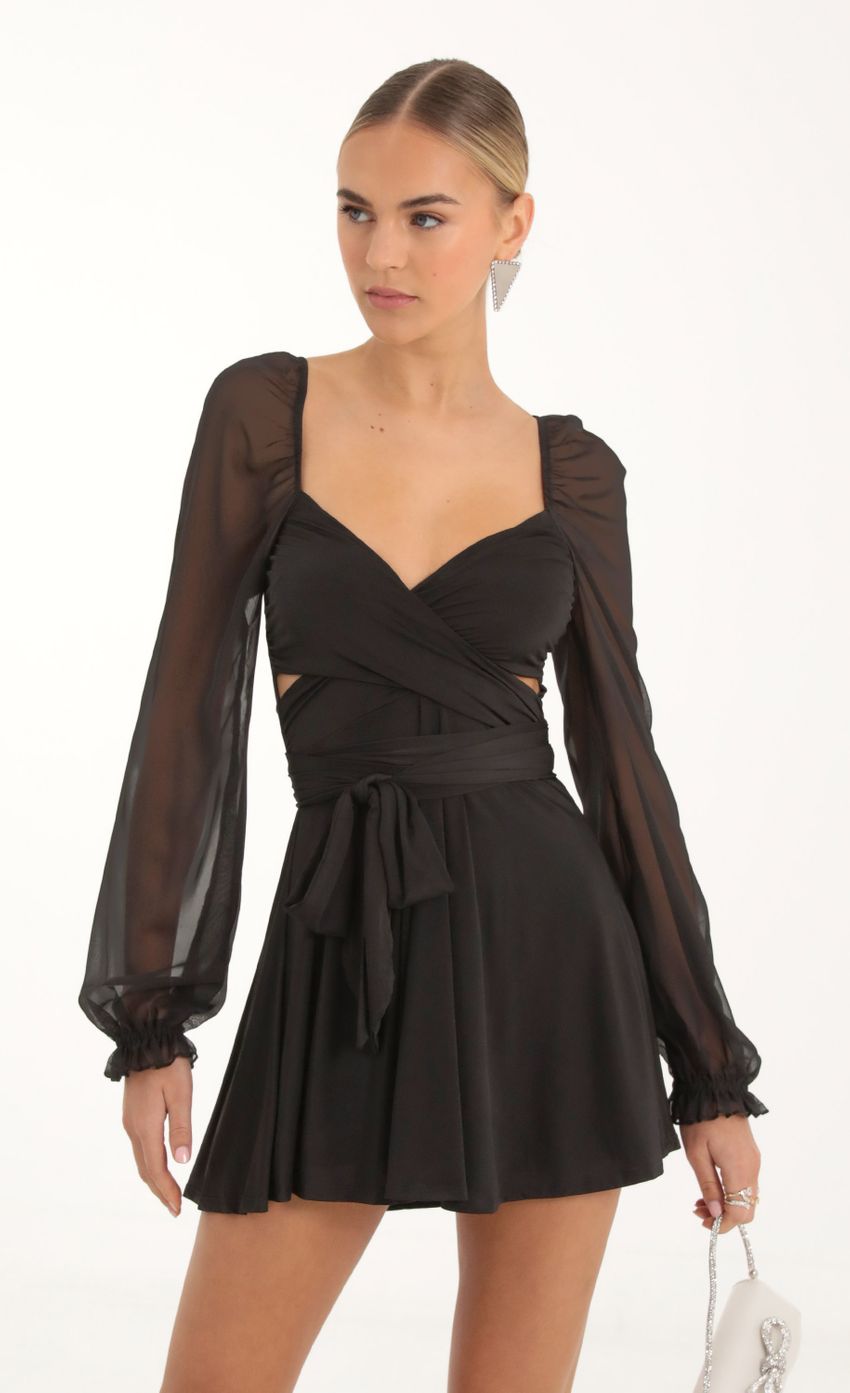 Picture Aliah Puff Chiffon Wrap Dress in Black. Source: https://media.lucyinthesky.com/data/Nov22_1/850xAUTO/1V9A2239.JPG
