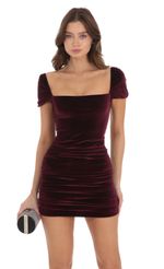 Picture Square Neck Velvet Ruched Bodycon Dress in Maroon. Source: https://media.lucyinthesky.com/data/Nov23/150xAUTO/14f4fffa-e1d4-43e6-b8ab-4671dff5e3cc.jpg