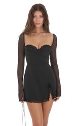 Picture Ruffle Long Sleeve Dress in Black. Source: https://media.lucyinthesky.com/data/Nov23/150xAUTO/dfa69377-aa4c-4623-ae6a-525520799040.jpg