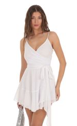 Picture Ava Wrap Dress in White Shimmer. Source: https://media.lucyinthesky.com/data/Nov23/150xAUTO/fd6aafda-bc43-4b7c-b6b8-9ea5bf48f175.jpg