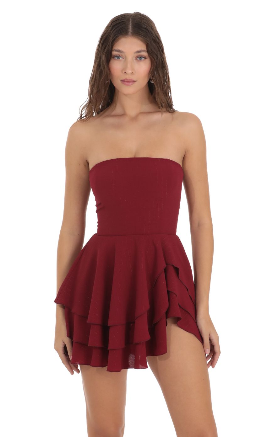 Picture Shimmer Striped Strapless Asymmetrical Dress in Maroon. Source: https://media.lucyinthesky.com/data/Nov23/850xAUTO/05a3e86f-2b6d-40a1-89eb-424aeb60cc86.jpg