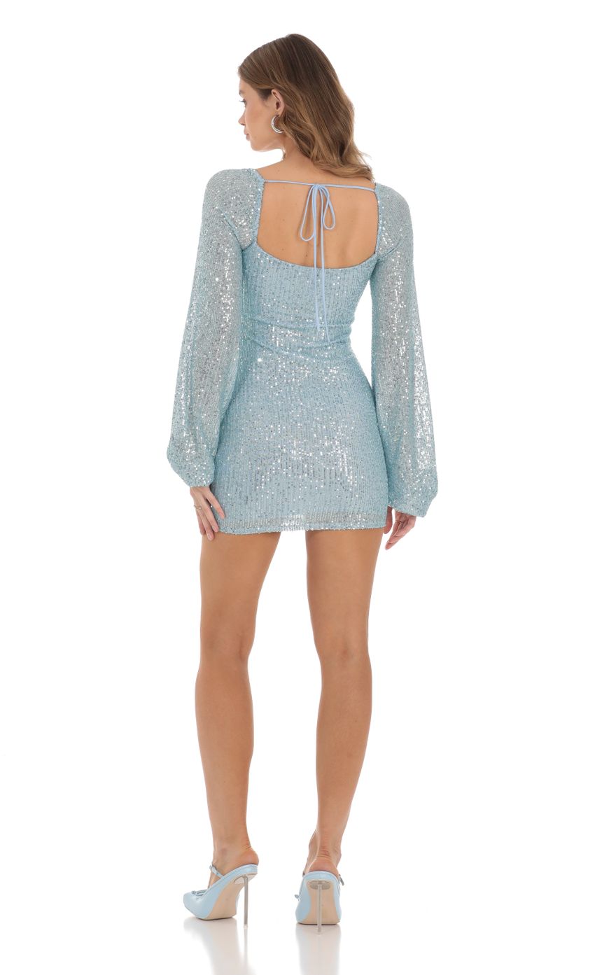 Picture Shantelle Sequin Long Sleeve Dress in Blue. Source: https://media.lucyinthesky.com/data/Nov23/850xAUTO/2b66dfda-a72a-4a74-bc59-ab2867c331f3.jpg