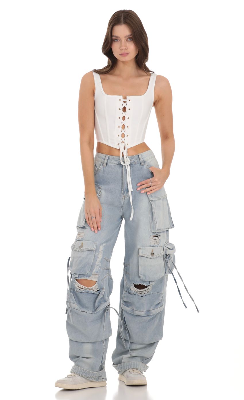 Picture Lace-Up Corset Top in White. Source: https://media.lucyinthesky.com/data/Nov23/850xAUTO/b844d8ec-f7f9-4257-bcf8-cbaed452cb58.jpg