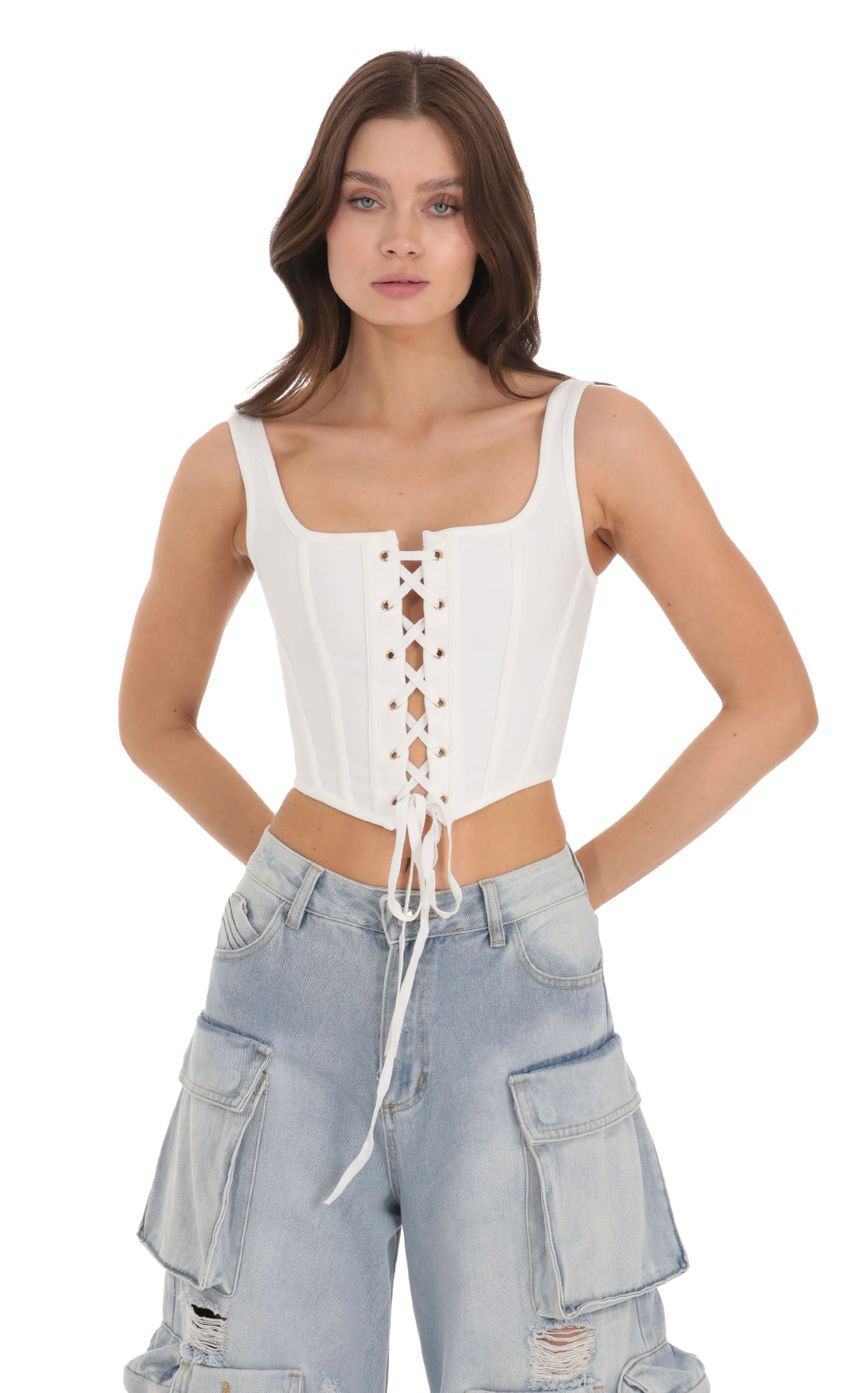 Picture Lace-Up Corset Top in White. Source: https://media.lucyinthesky.com/data/Nov23/850xAUTO/f1731f08-ffe2-4766-a7a3-c8678c01c75e.jpg