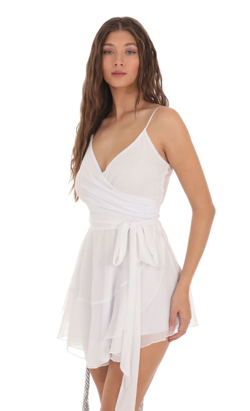 Picture Ava Wrap Dress in White Shimmer. Source: https://media.lucyinthesky.com/data/Nov23/850xAUTO/f5a1f360-48f9-46be-8126-5cb08240f360.jpg