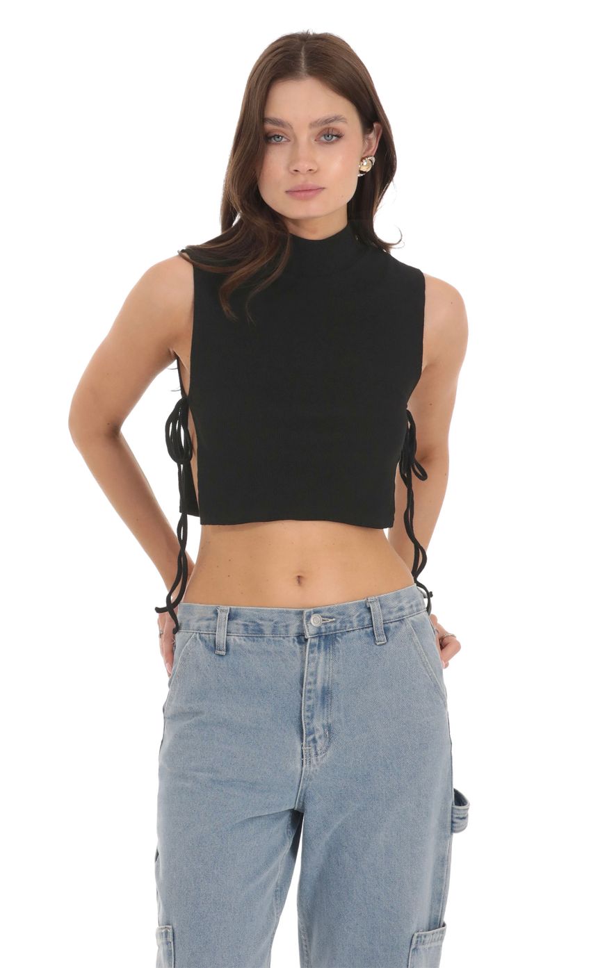 Picture Ribbed Mock Neck Top in Black. Source: https://media.lucyinthesky.com/data/Nov23/850xAUTO/f7609019-aaa1-47be-ae84-00c6cd1a2cd0.jpg