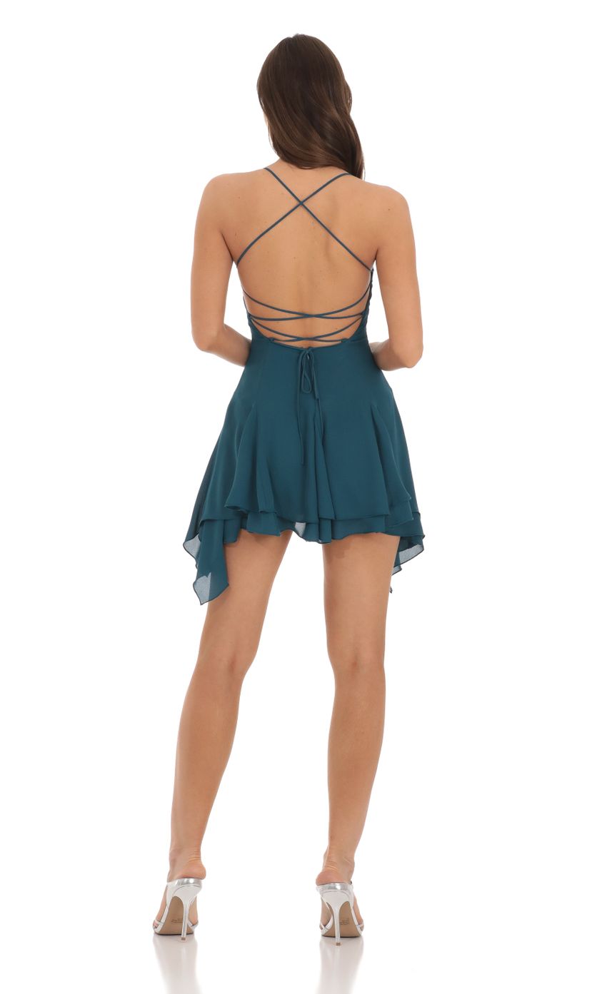 Picture Asymmetrical Side Flare Dress in Teal. Source: https://media.lucyinthesky.com/data/Nov23/850xAUTO/fcc63324-9d52-47f8-9081-6ab2d0309887.jpg