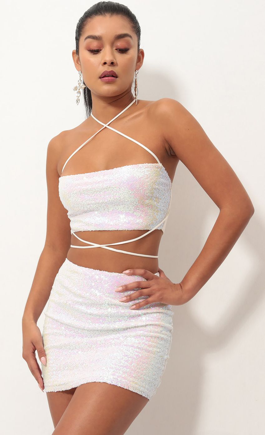 Picture Eva Iridescent Sequin Skirt Set in White. Source: https://media.lucyinthesky.com/data/Oct18_1/850xAUTO/0Y5A3016S.JPG