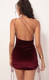 Picture thumb Afterglow Velvet Shoulder Ruched Dress in Wine. Source: https://media.lucyinthesky.com/data/Oct19_2/170xAUTO/781A9407.JPG