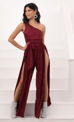 Picture Mary One Shoulder Jumpsuit in Burgundy Shimmer. Source: https://media.lucyinthesky.com/data/Oct20_1/150xAUTO/1V9A2115.JPG