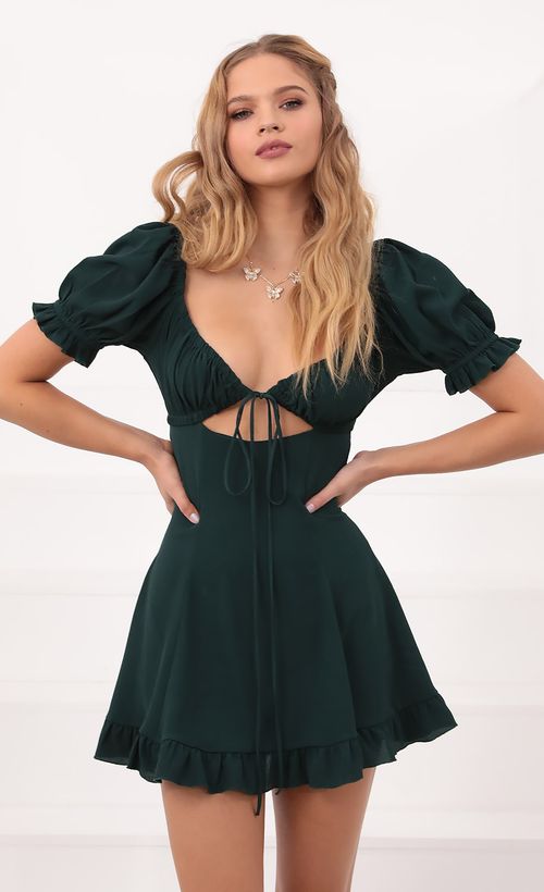 Picture Isela Puff Sleeve Dress in Hunter Green. Source: https://media.lucyinthesky.com/data/Oct20_1/500xAUTO/781A6357.JPG
