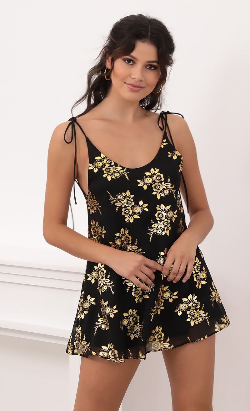 Picture Kiara Gold Floral Chiffon Tie Dress in Black. Source: https://media.lucyinthesky.com/data/Oct20_1/800xAUTO/1V9A6127.JPG