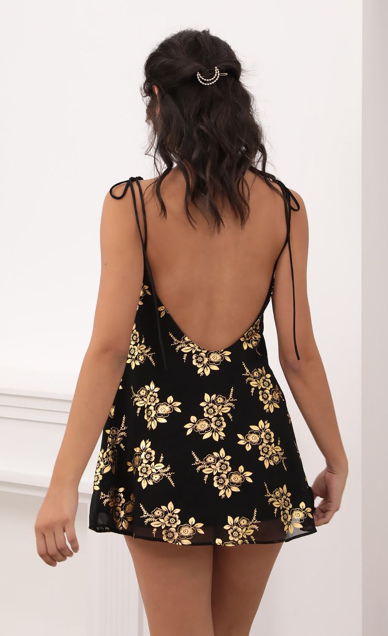 Picture Kiara Gold Floral Chiffon Tie Dress in Black. Source: https://media.lucyinthesky.com/data/Oct20_1/800xAUTO/1V9A6197.JPG