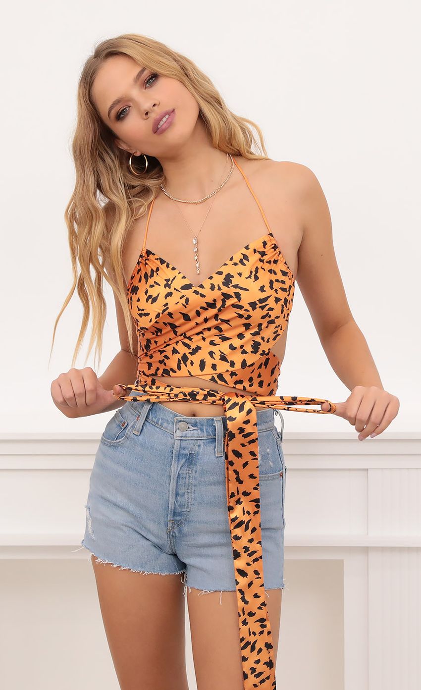 Picture Leopard Satin Bow Tie Top In Orange. Source: https://media.lucyinthesky.com/data/Oct20_1/850xAUTO/1V9A2862.JPG