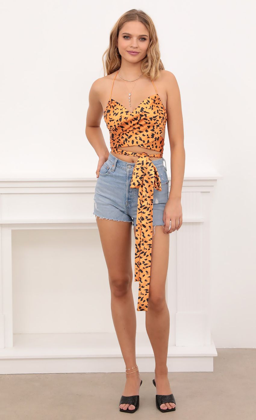 Picture Leopard Satin Bow Tie Top In Orange. Source: https://media.lucyinthesky.com/data/Oct20_1/850xAUTO/1V9A2993.JPG