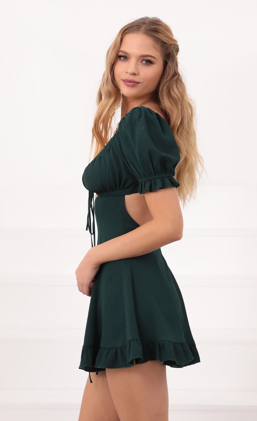 Picture Isela Puff Sleeve Dress in Hunter Green. Source: https://media.lucyinthesky.com/data/Oct20_1/850xAUTO/781A6393.JPG